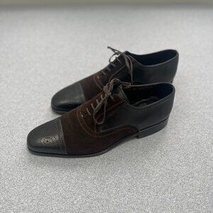 Black and brown Canali dress shoes